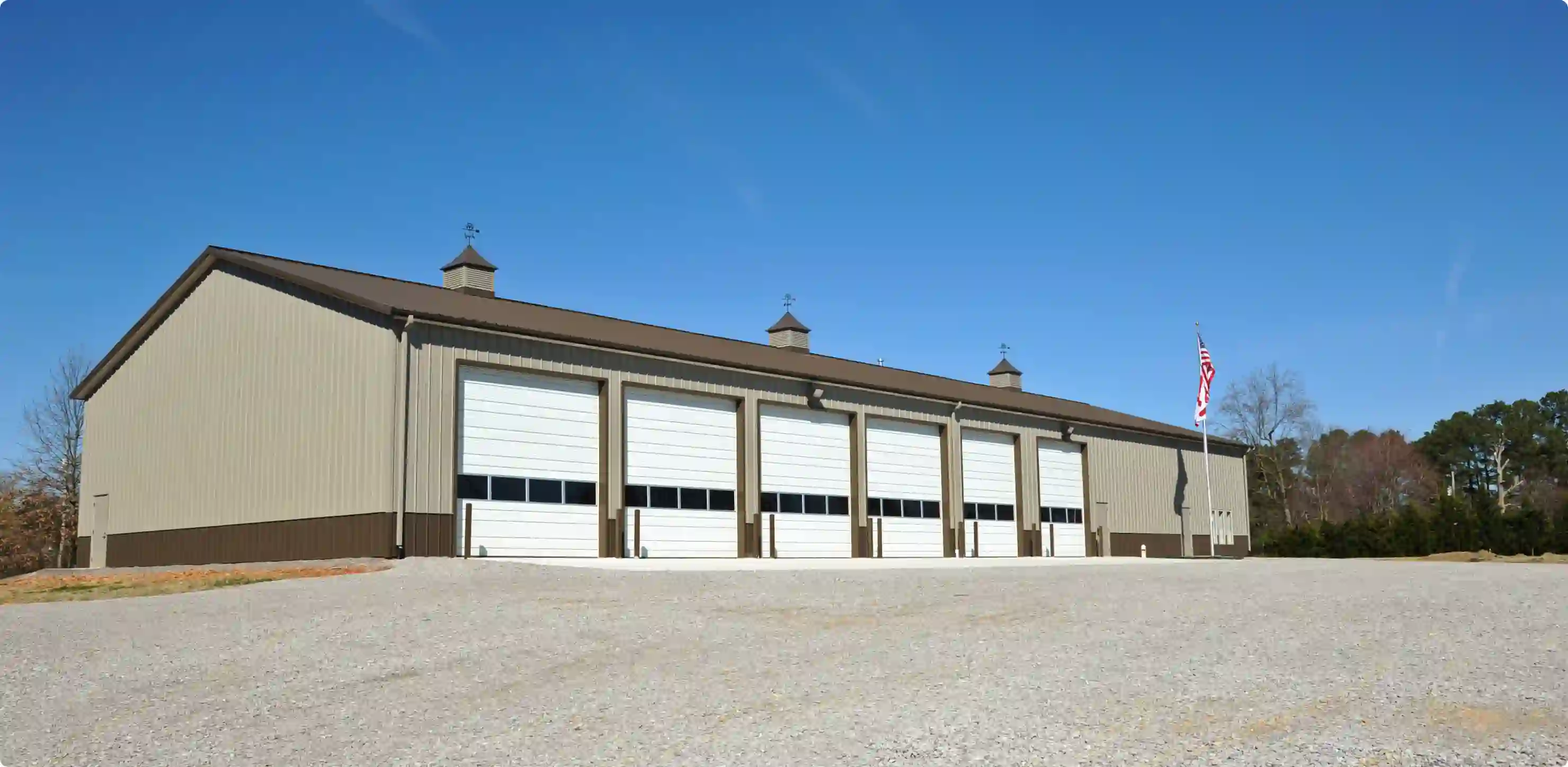 five garages with garage doors